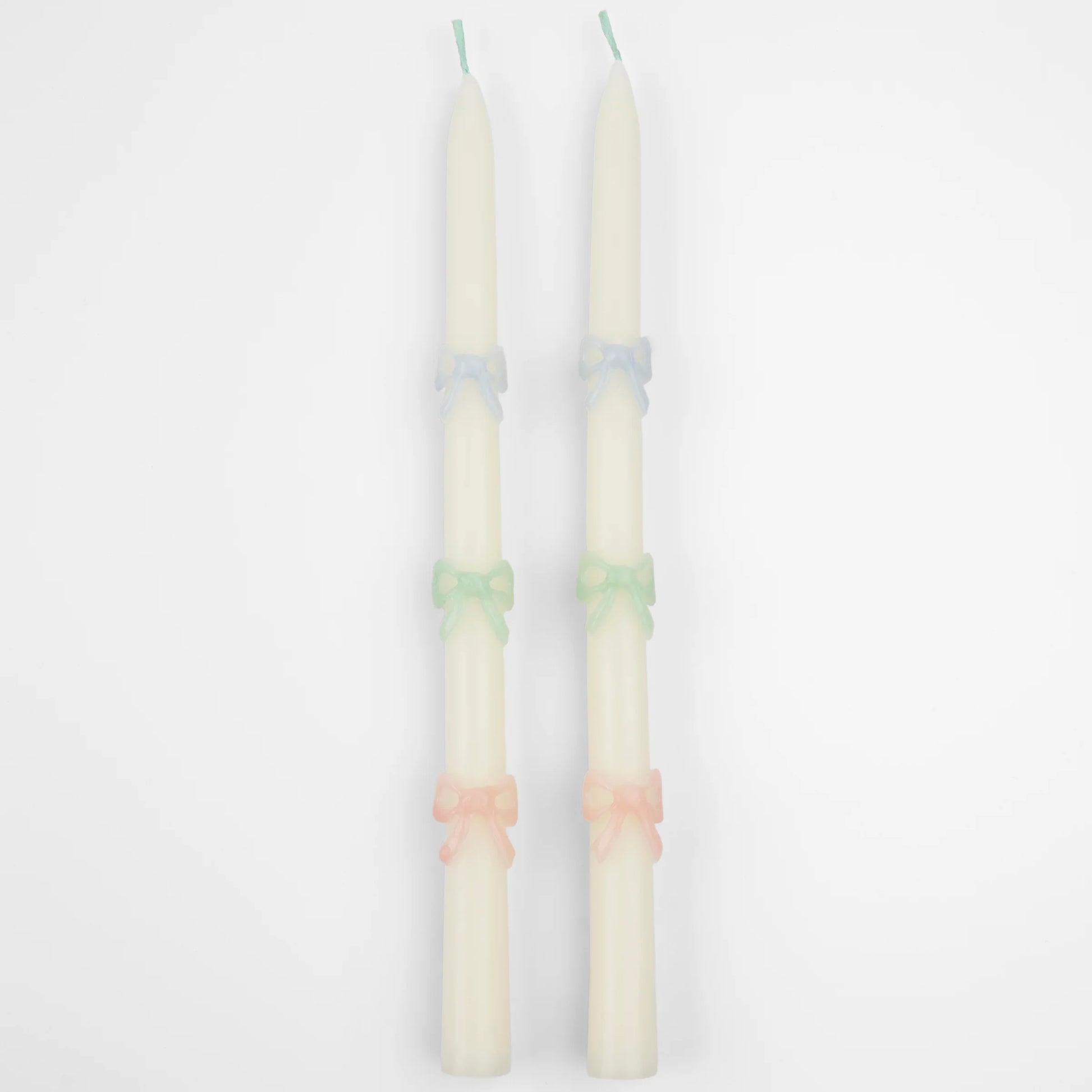 Velas largas con lazos