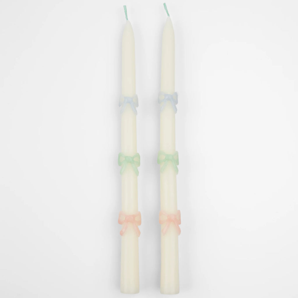 Velas largas con lazos